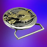 Belt buckle with a gold and silver design on a gradient blue background